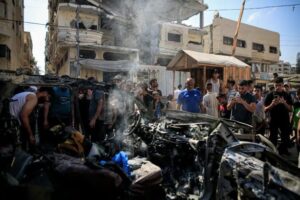 Israeli Strike On Gaza Vehicle Kills Two, Injures 13 Amid Ceasefire Tensions
